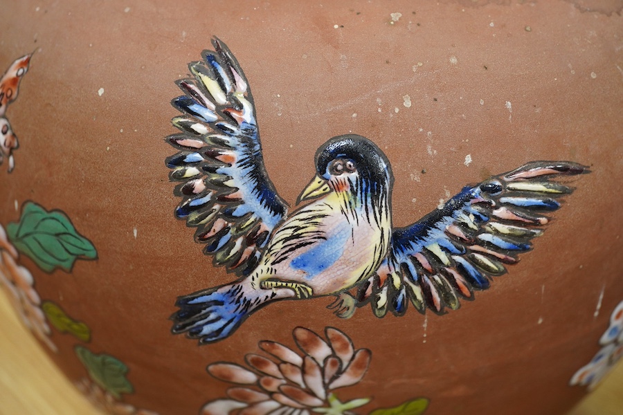 A pair of Japanese enamelled terracotta jars, c.1900, 26cm high. Condition - fair to good
